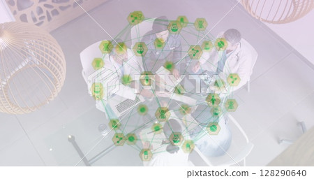 Image of network of connection with medical icons over male and female scientist doctors sitting Image of network of connection with medical icons over male and female scientist doctors sitting 128290640
