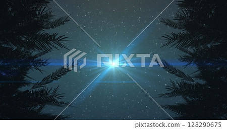 Image of glowing spot flickering and disappearing on night sky with stars surrounded by trees Image of glowing spot flickering and disappearing on night sky with stars surrounded by trees 128290675