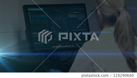 Image of female scientist looking at computer screen with data processing Image of female scientist looking at computer screen with data processing 128290680