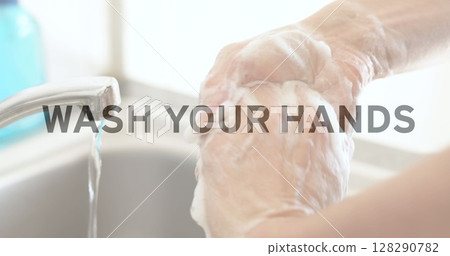 Hands washing with soap under running water, promoting hygiene and cleanliness Hands washing with soap under running water, promoting hygiene and cleanliness 128290782