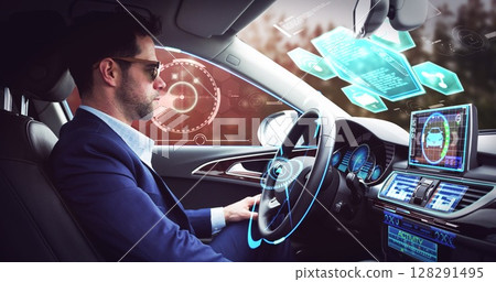 Image of digital interface over businessman in self-driving car Image of digital interface over businessman in self-driving car 128291495