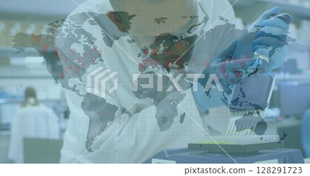 Image of world map with hands of scientist testing with equipment in lab Image of world map with hands of scientist testing with equipment in lab 128291723