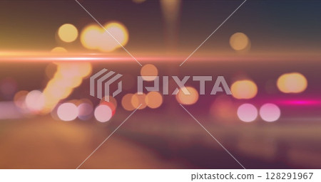 Image of flashing lights over a highway 128291967
