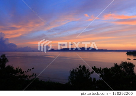 Sunrise over Nago Bay 128292200