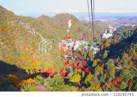 Mt. Rokko as seen from the Rokko-Arima Ropeway, and the autumn leaves of Arima Onsen / Setonaikai National Park Mt. Rokko as seen from the Rokko-Arima Ropeway, and the autumn leaves of Arima Onsen / Setonaikai National Park 128292793