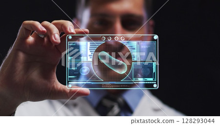 Image of scientist holding interactive screen with medical data processing 128293044