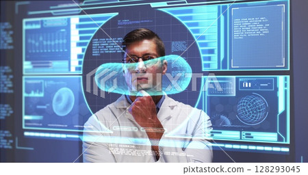 Image of male scientist behind interactive computer screen with medical data processing 128293045