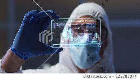 Image of male scientist holding digital screen with covid 19 cell 128293074