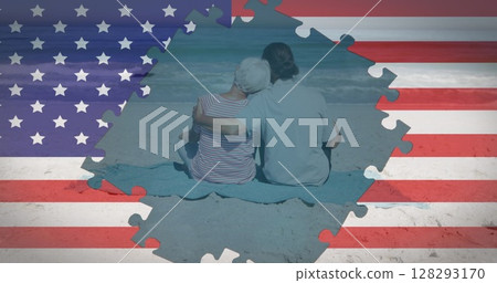 Image of american flag jigsaw puzzles revealing senior couple embracing on beach 128293170