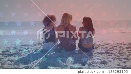 Multiple blinking stars against group of friends walking together on the beach 128293193
