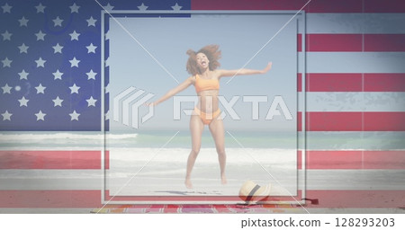 Image of american flag waving over woman jumping on beach Image of american flag waving over woman jumping on beach 128293203