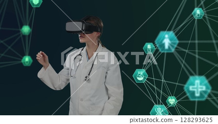 Doctor using VR headset interacting with digital medical interfaces in virtual space 128293625