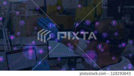 Scientist using VR headset interacting with digital interface in laboratory Scientist using VR headset interacting with digital interface in laboratory 128293643
