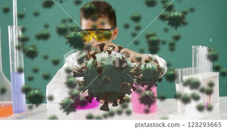 Conducting experiment with colorful liquids, child scientist in lab coat in school 128293665