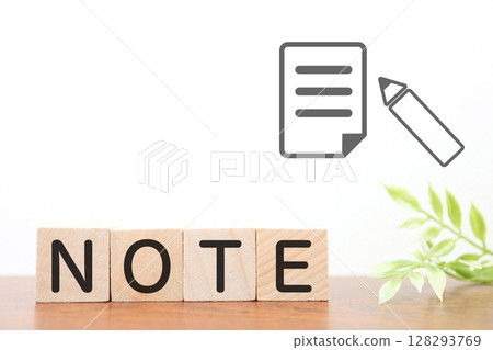 Photo of a wooden block with the word NOTE and a notepad icon Photo of a wooden block with the word NOTE and a notepad icon 128293769