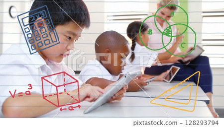 Students in school using tablets for learning, focusing on educational activities 128293794