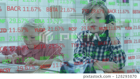 Children in office playing with phone and tablet, stock market data overlay 128293870