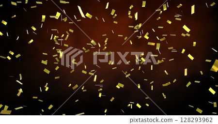 Image of gold confetti falling over orange clouds 128293962