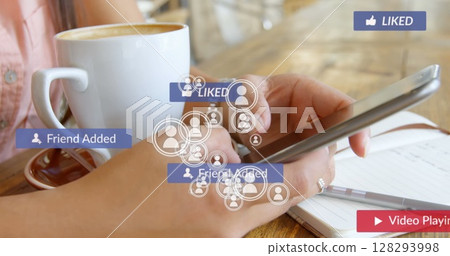 Image of falling social media icons over women using smartphone Image of falling social media icons over women using smartphone 128293998