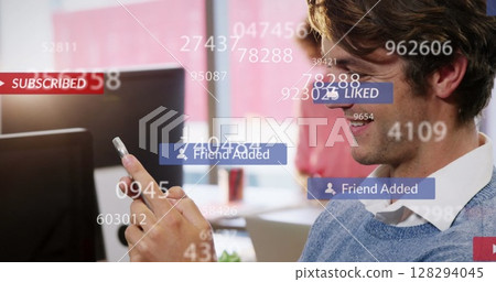 Image of falling social media icons over men using smartphone 128294045