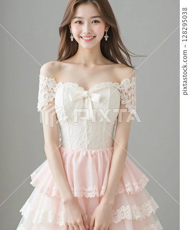 A girl in a dress is looking to the side 128295038