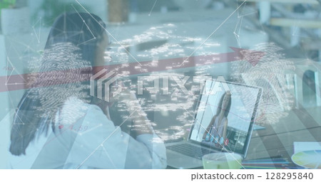 Image of online security padlock and biometric fingerprint over woman on laptop image call Image of online security padlock and biometric fingerprint over woman on laptop image call 128295840