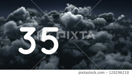 Dark storm clouds forming in sky with large white number 35 overlay Dark storm clouds forming in sky with large white number 35 overlay 128296218
