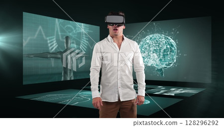 Image of businessman wearing vr headset over screens with medical data processing Image of businessman wearing vr headset over screens with medical data processing 128296292