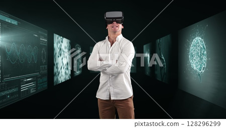 Image of businessman wearing vr headset over screens with medical data processing 128296299