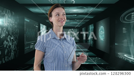Image of businesswoman holding tablet over screens with medical data processing 128296300