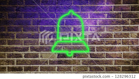 Neon green bell glowing on brick wall, creating urban street art vibe 128296312