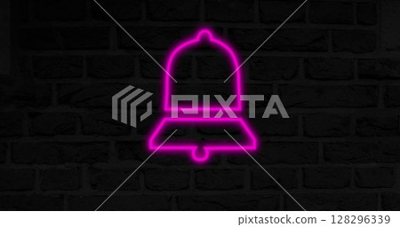 Neon pink bell glowing against dark brick wall, creating vibrant contrast 128296339