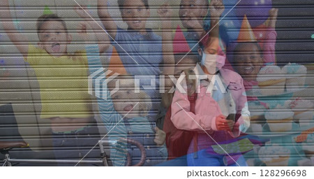 Using smartphone in school, Asian woman looking at children in classroom Using smartphone in school, Asian woman looking at children in classroom 128296698