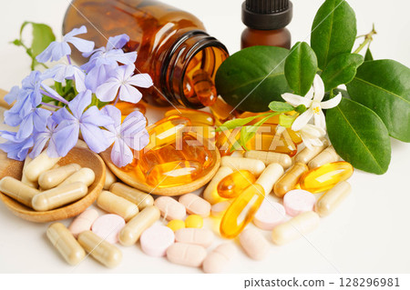 Alternative medicine herbal organic capsule with vitamin E omega 3 fish oil, mineral, drug with herbs leaf natural supplements for healthy good life. Alternative medicine herbal organic capsule with vitamin E omega 3 fish oil, mineral, drug with herbs leaf natural supplements for healthy good life. 128296981