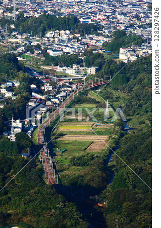 Hadano Basin with Odakyu Line running as seen from Matsudayama 128297426