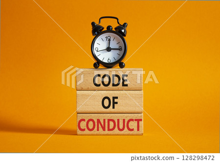 Code of conduct symbol. Wooden blocks with words Code of conduct with alarm clock. Beautiful orange background. Business and Code of conduct concept. Copy space. Code of conduct symbol. Wooden blocks with words Code of conduct with alarm clock. Beautiful orange background. Business and Code of conduct concept. Copy space. 128298472