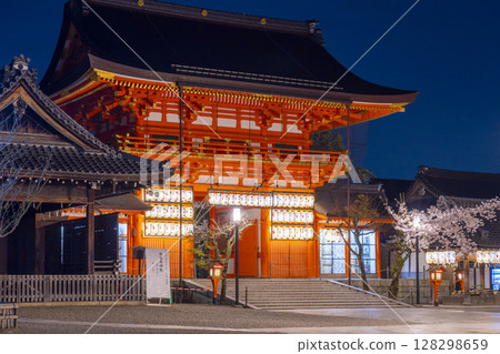 Kyoto Yasaka Shrine South Tower Gate and Cherry Blossoms at Night 128298659