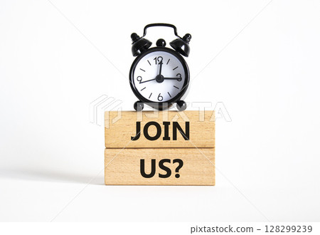 Join us symbol. Concept word Join us on wooden blocks. Beautiful white background with alarm clock. Business and Join us concept. Copy space 128299239