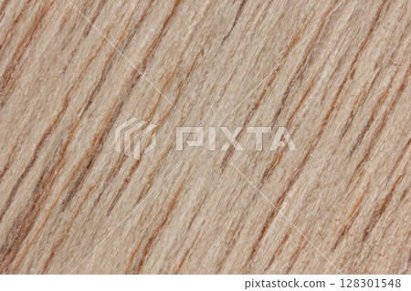 Close-up of natural wood texture with grain patterns. 128301548