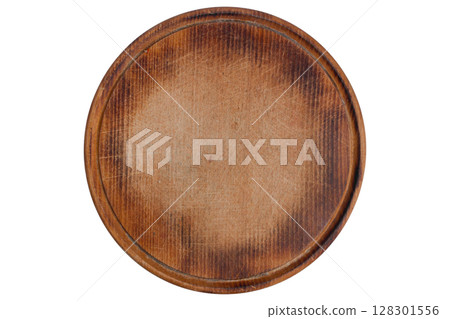 Round wooden board with textured brown surface. Round wooden board with textured brown surface. 128301556