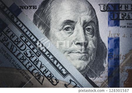 Close-up of US dollar bill featuring Benjamin Franklin. 128301587
