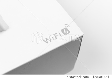 Close-up of a white box featuring a WiFi 6 logo. 128301661