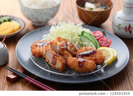 Crispy pork fillet cutlet set meal Japanese-style meal of pork cutlet and colorful vegetables Crispy pork fillet cutlet set meal Japanese-style meal of pork cutlet and colorful vegetables 128301934