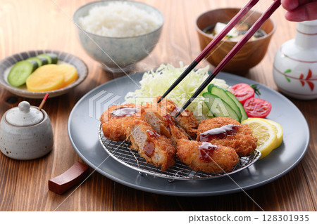 Crispy pork fillet cutlet set meal Japanese-style meal of pork cutlet and colorful vegetables Crispy pork fillet cutlet set meal Japanese-style meal of pork cutlet and colorful vegetables 128301935