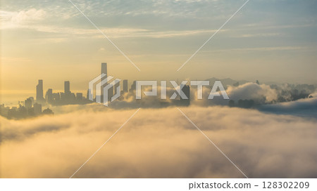 March 2 2025 Captivating Urban Skyline Shrouded in Morning Mist During Sunset March 2 2025 Captivating Urban Skyline Shrouded in Morning Mist During Sunset 128302209