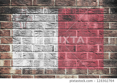 Malta flag on old brick wall background Malta flag on old brick wall background 128302764