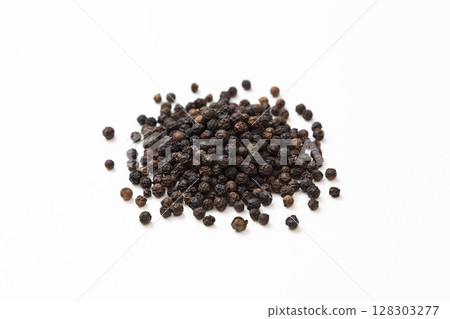 Black pepper on a white background Black pepper on a white background 128303277