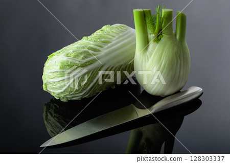 Fresh fennel bulb with green stalks and Chinese cabbage. Fresh fennel bulb with green stalks and Chinese cabbage. 128303337