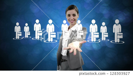 Businesswoman in suit reaching out with digital icons of professionals in background 128303927