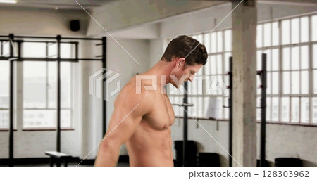 Image of stressed strong muscular caucasian man in gym Image of stressed strong muscular caucasian man in gym 128303962
